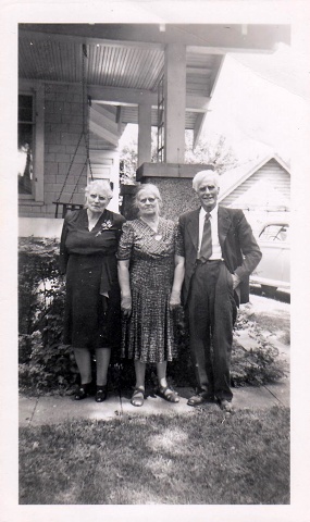 # 49  (On reverse) "Thora Roman, Jenny Siemers, and their brother."