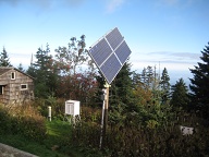 Steerable solar array provides some power on sunny days but there's also a backup propane generator. Tank farm with 30+ propane tanks supplies fuel. No electricity for guests. Mostly used in kitchen.